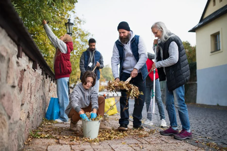 diverse group of happy volunteers cleaning up stre 2024 10 22 07 24 55 utc 1