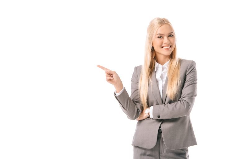 attractive blonde businesswoman smiling and showin 2024 11 17 17 25 20 utc